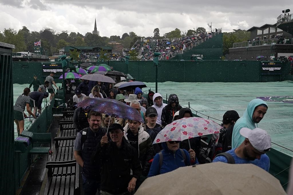 Protests and Rain Disrupt Play at Wimbledon: Djokovic Makes History, Pliskova Upset, and Environmental Activists Cause Chaos